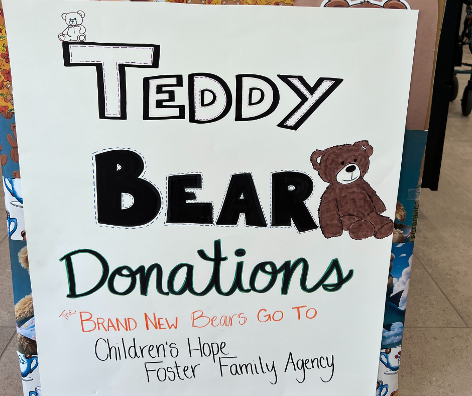 A sign that says teddy bear donations on it