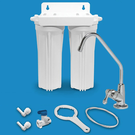 Water filter system with two white canisters, faucet, and installation accessories.