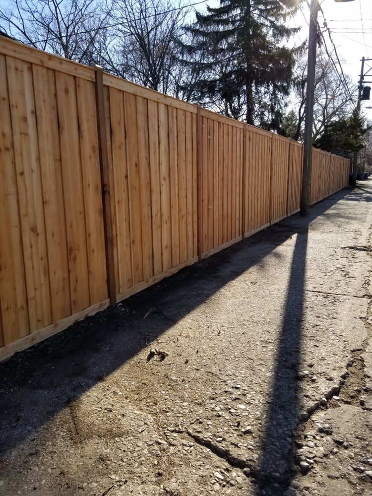 Wooden Fence Along the Sidewalk — Maywood, IL — Anaya and Sons Fence Company