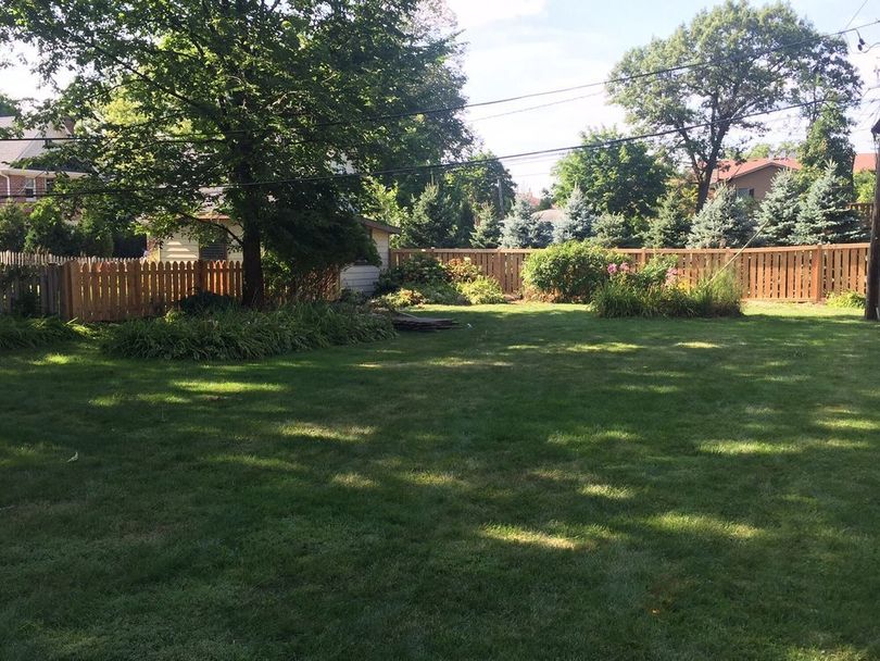 Garden with Beautiful Lawn — Maywood, IL — Anaya and Sons Fence Company