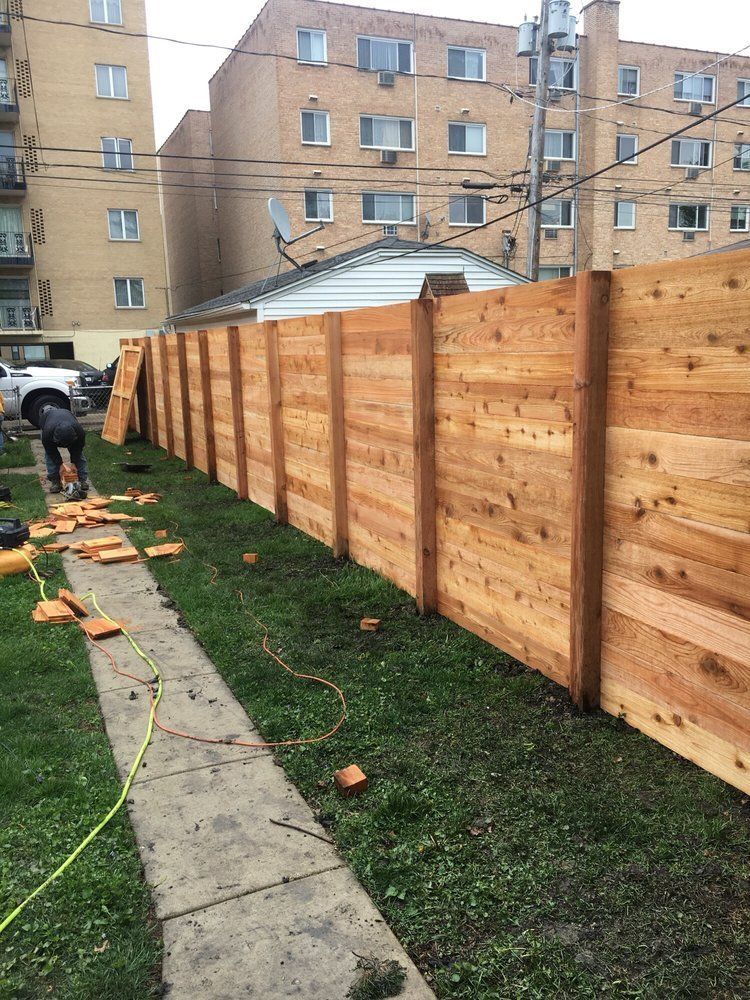 Side of Commercial Wooden Fence — Maywood, IL — Anaya and Sons Fence Company