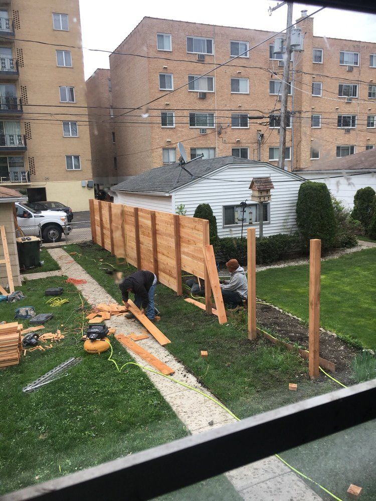 Staff Adding Fence — Maywood, IL — Anaya and Sons Fence Company