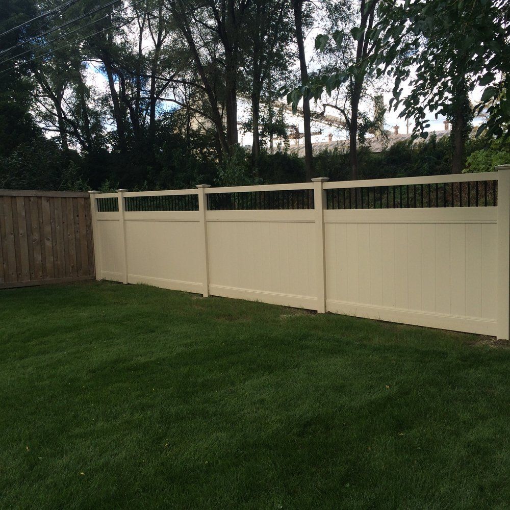 Dirty White Wall Fence — Maywood, IL — Anaya and Sons Fence Company