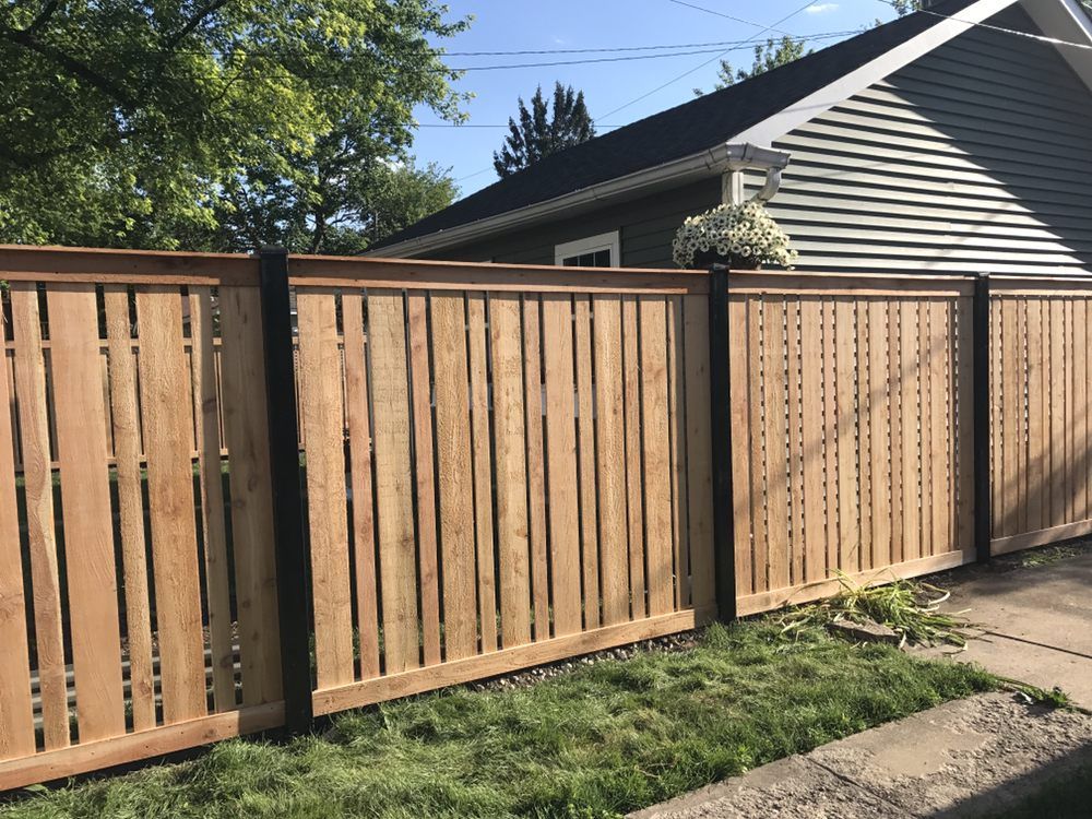 Fence with Flowers — Maywood, IL — Anaya and Sons Fence Company