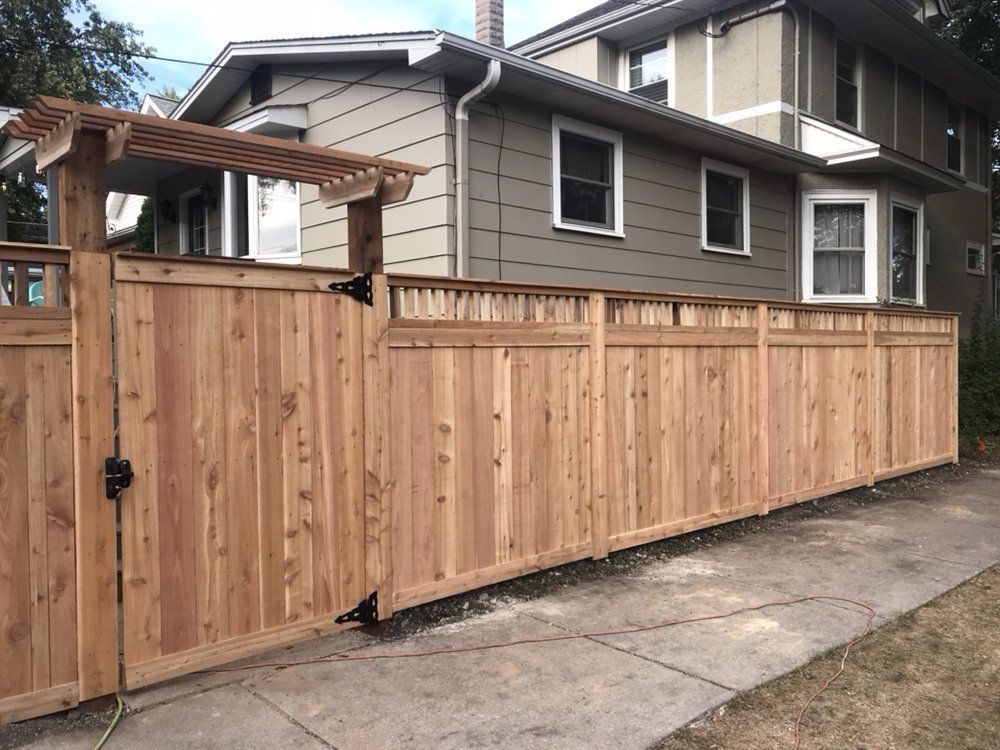 Wooden Fence and Modern House — Maywood, IL — Anaya and Sons Fence Company