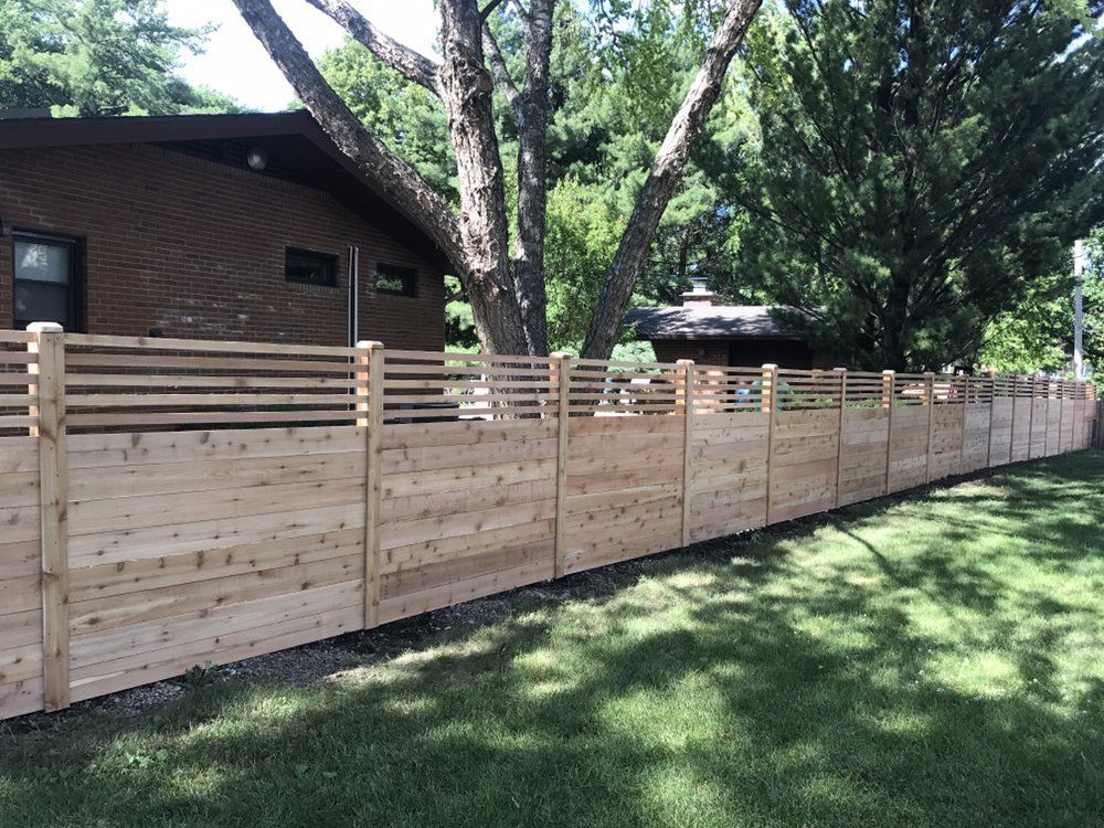 Pallet Fence with Trees — Maywood, IL — Anaya and Sons Fence Company