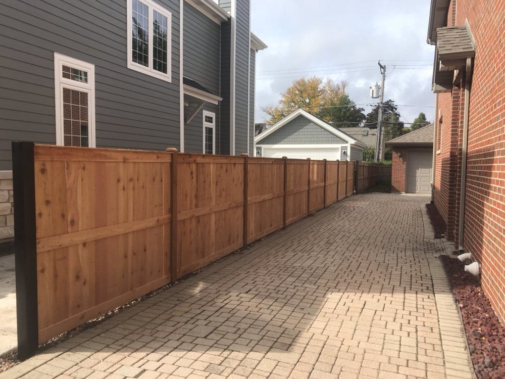 Shadow of a Wooden Fence — Maywood, IL — Anaya and Sons Fence Company
