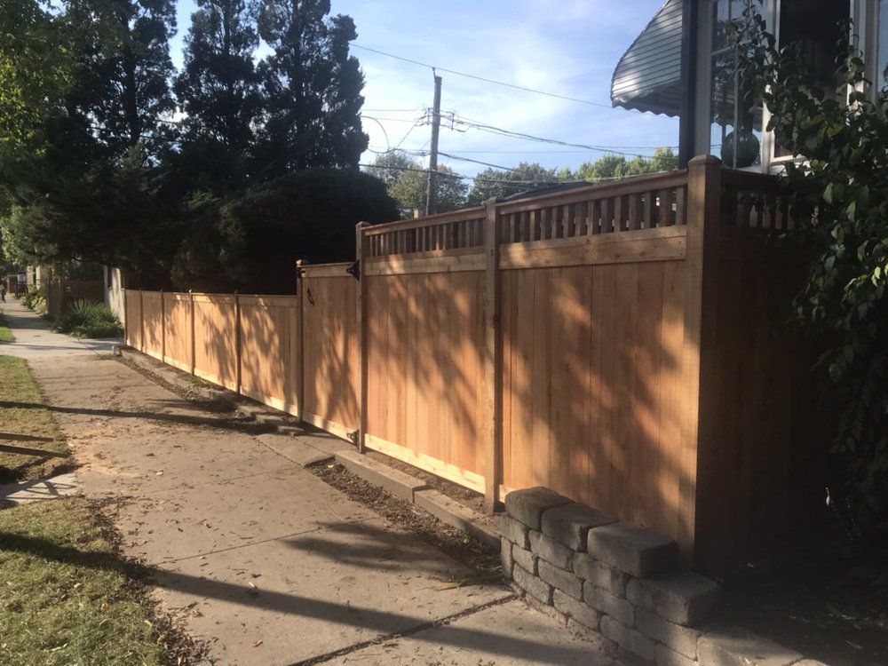 House Backyard Fence with Snowfall — Maywood, IL — Anaya and Sons Fence Company
