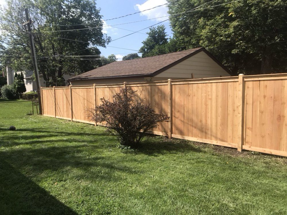 Custom Wooden Fence on a Sunny Day — Maywood, IL — Anaya and Sons Fence Company