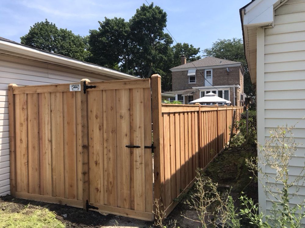Image of a House Wooden Fence — Maywood, IL — Anaya and Sons Fence Company