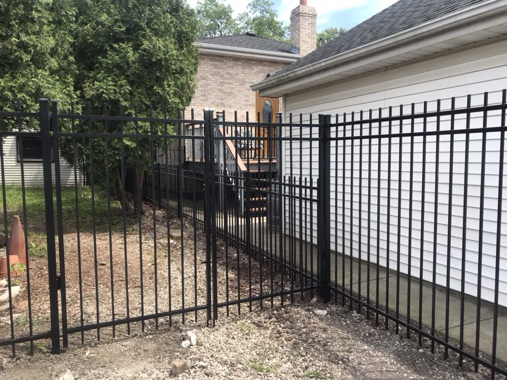 Black Metal Bars Fence Corner — Maywood, IL — Anaya and Sons Fence Company
