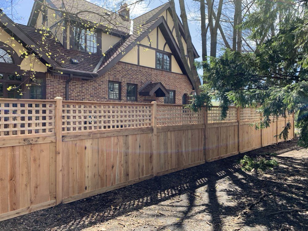 New Cedar Wood Fence Around House — Maywood, IL — Anaya and Sons Fence Company