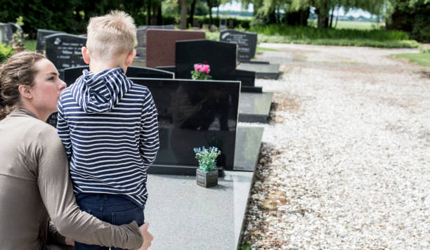 mother and son in the cemetery