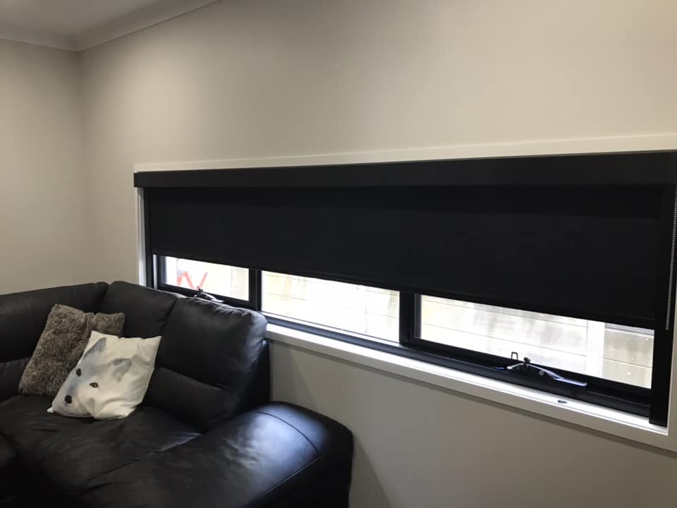 block out, black roller blinds installed in brisbane home