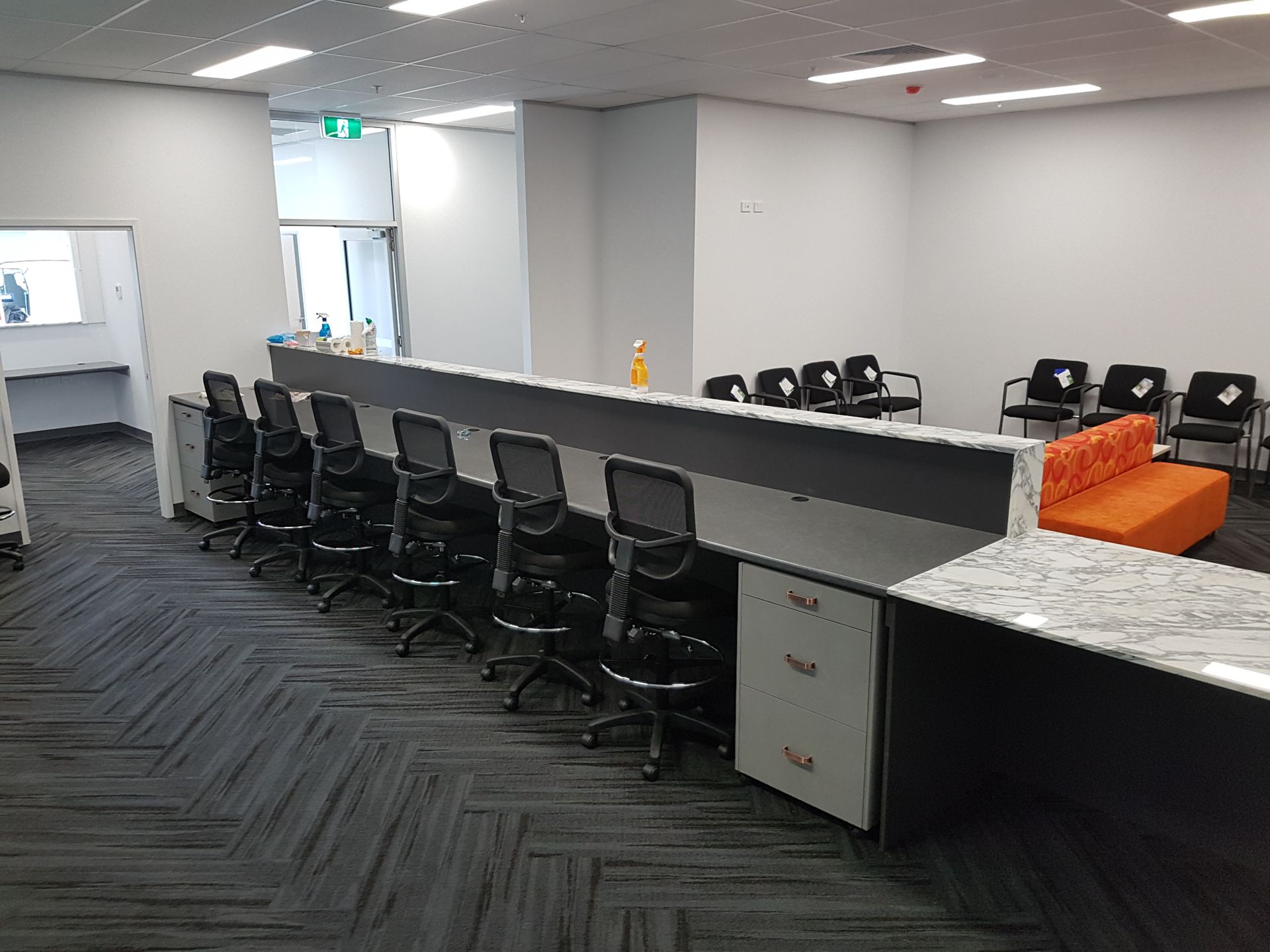 An Open Office Space With 6 Office Chairs — Tailored Interiors in Wacol, QLD
