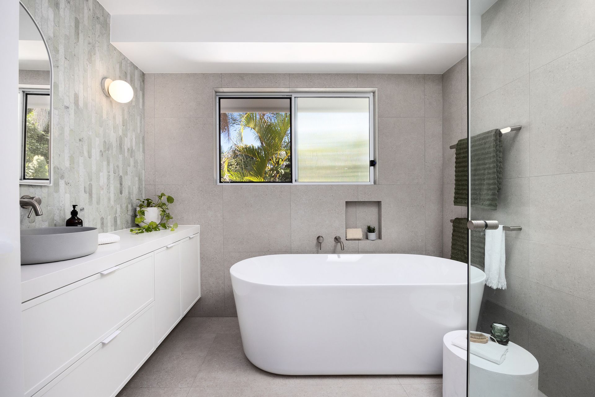 A Laundry Room with A Washer and Dryer and A Sink — Tailored Interiors in Morningside, QLD