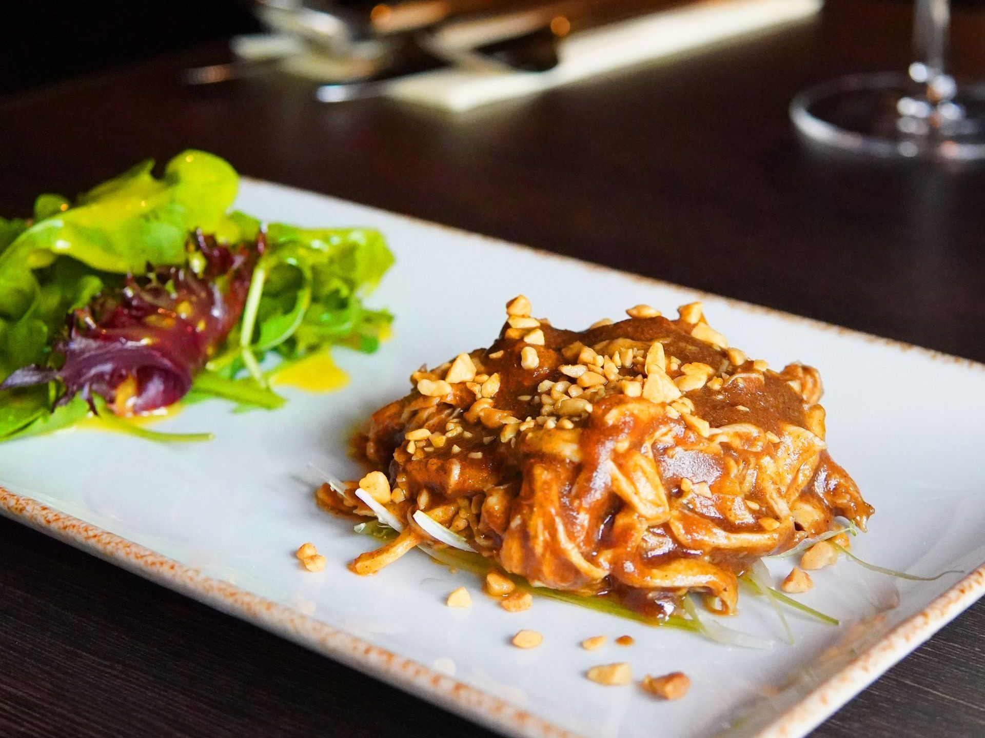 Dragon Pang Pang Chicken. Nutty and warming, the Dragon Pang Pang Chicken is set to be a firm favourite. The tender chicken is coated in a unique peanut hot sauce, giving a savoury, spicy flavour.