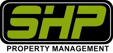 Logo for SHP Property Management with green letters on a black background.