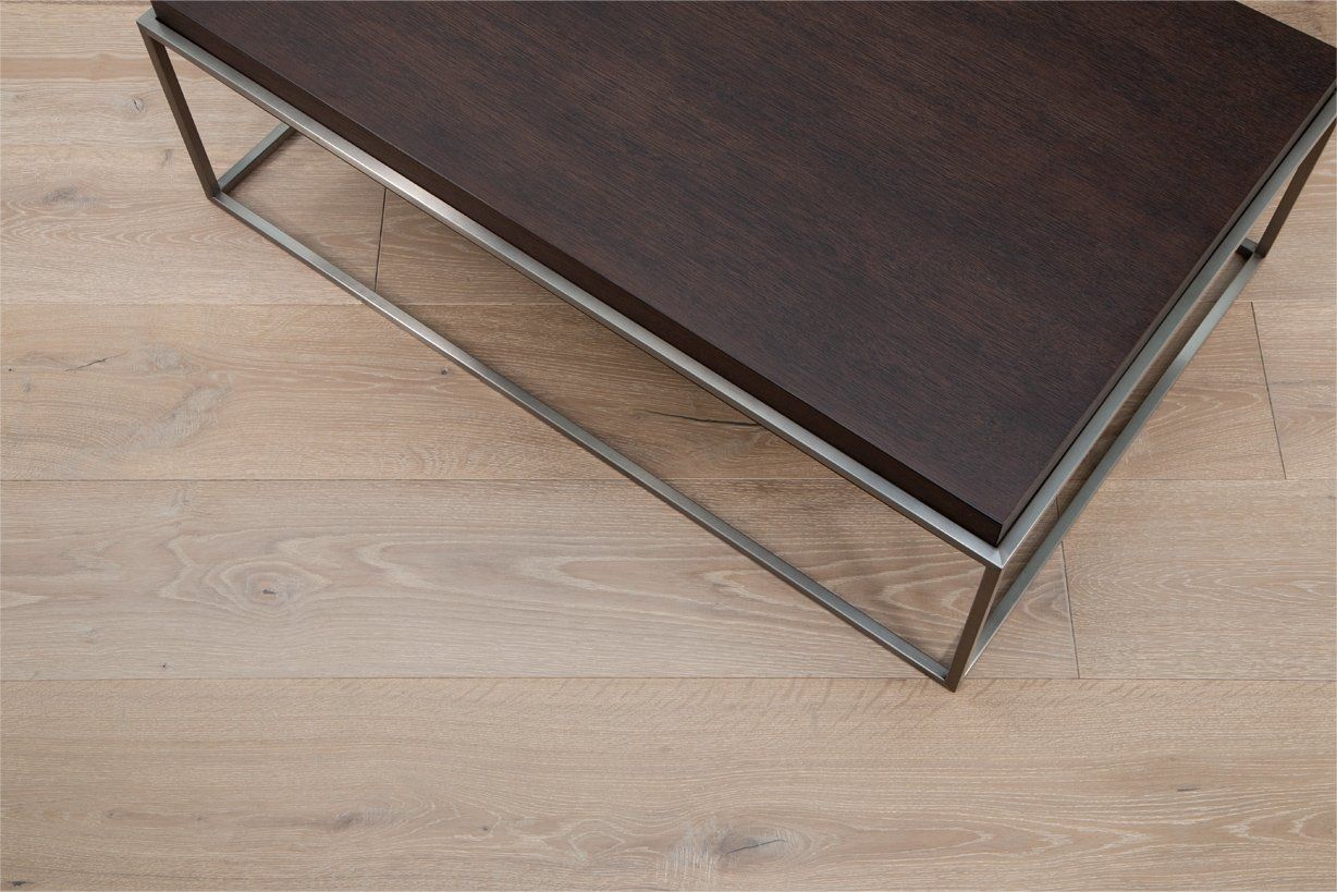 Cali Sauvignon Hardwood Flooring with a dark wood coffee table