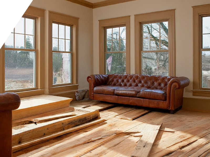 A photo of room with hardwood planks on the floor