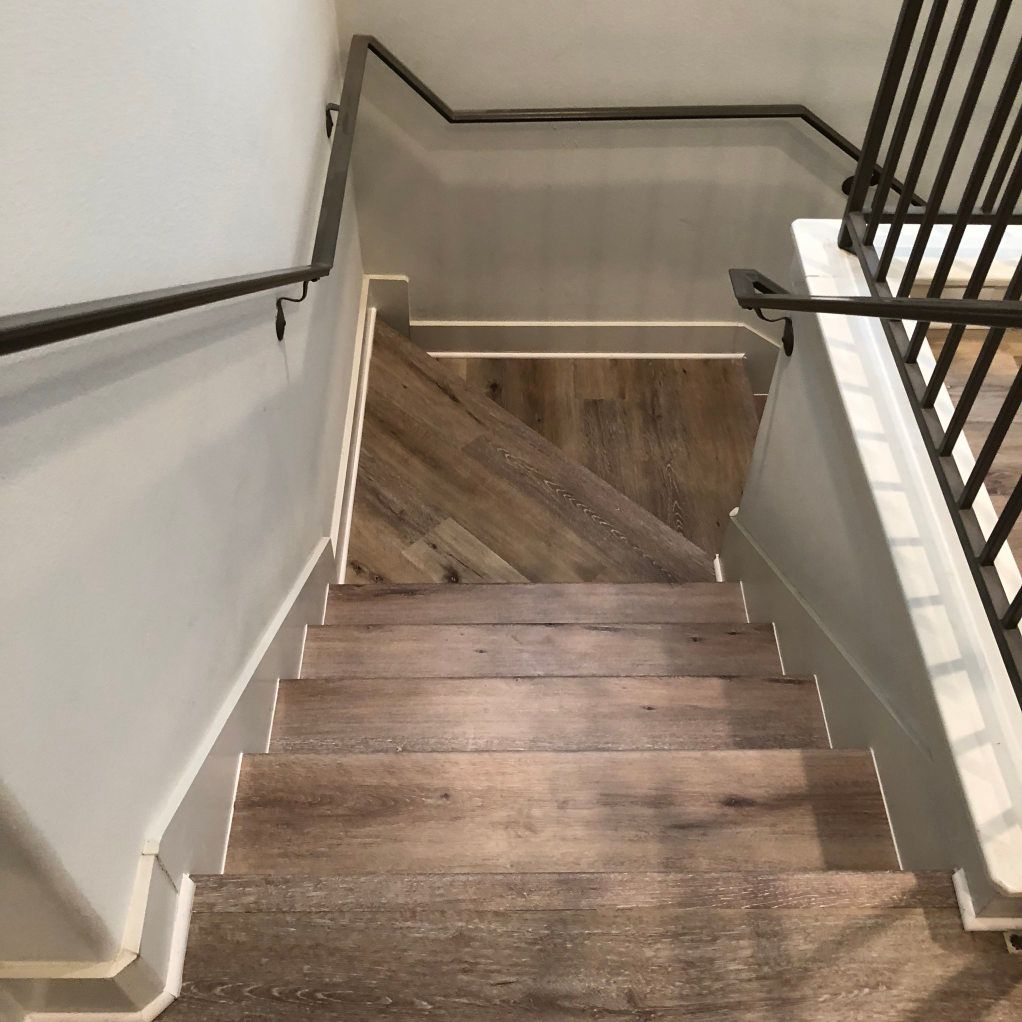 aged hickory vinyl flooring on staircase
