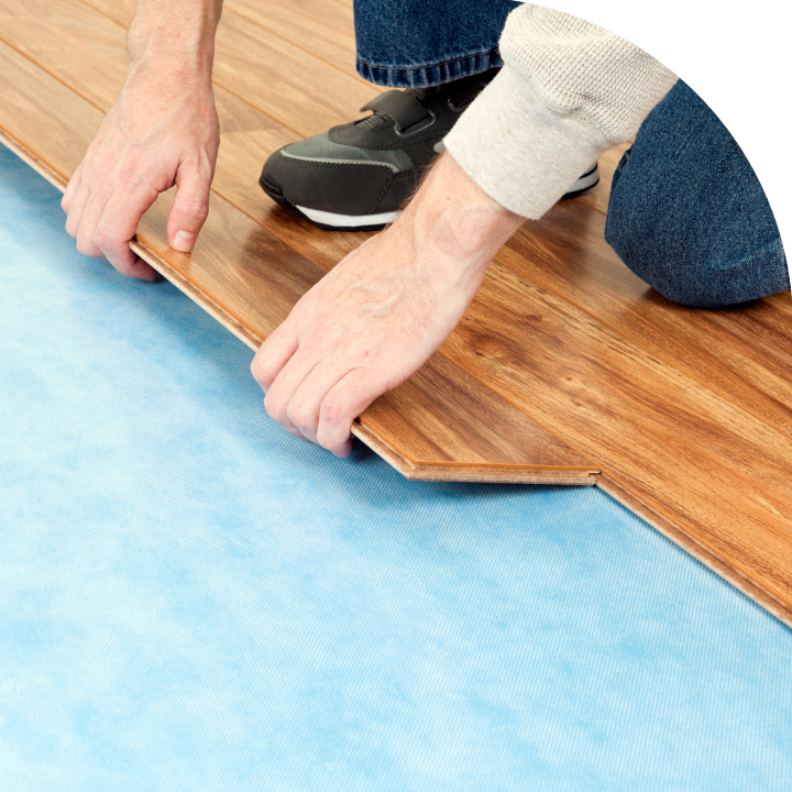 Floorsmith installing floorboards with accuracy