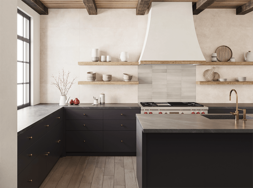 kitchen with black cabinets and premium tiles