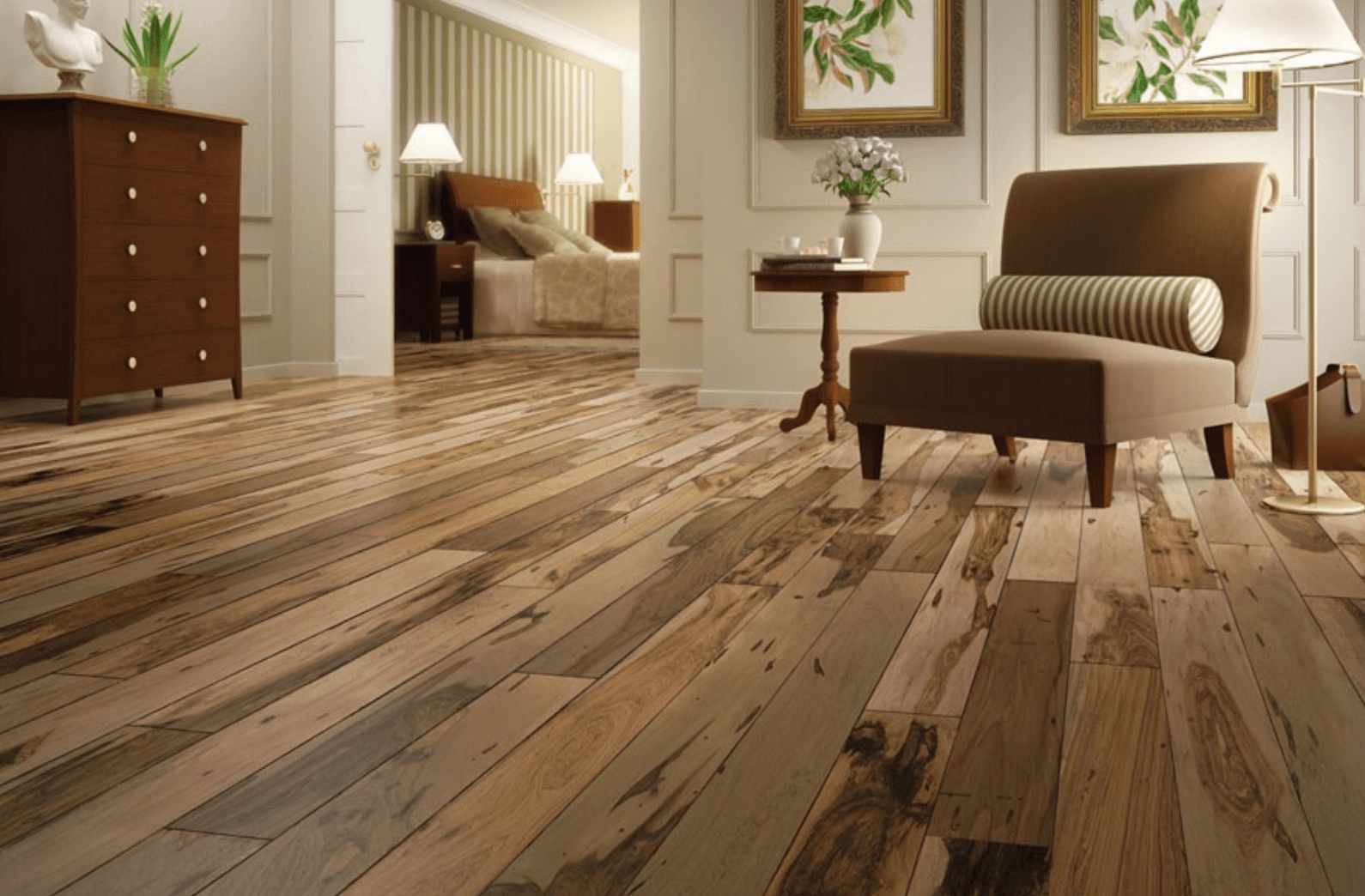 A large, luxurious living space with wooden laminated flooring