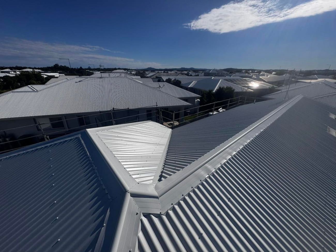 View From a Rooftop Showing the Pattern on the Metal Roofs of Buildings. — Venom Roofing Pty Ltd in Sunshine Coast, QLD