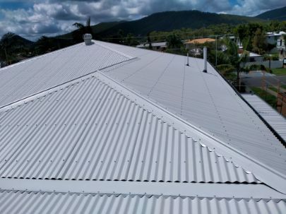 White Metal Roof on a House, Overlooking a Residential Area — Venom Roofing Pty Ltd in Sunshine Coast, QLD