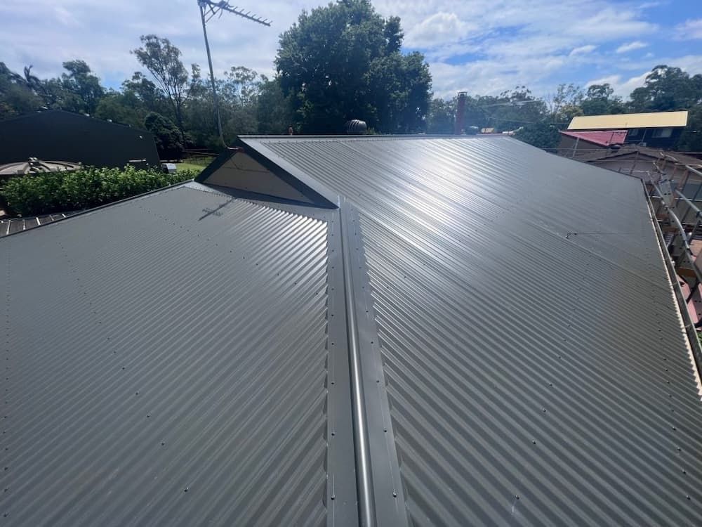 Gray Corrugated Metal Roof of a House — Venom Roofing Pty Ltd in Sunshine Coast, QLD
