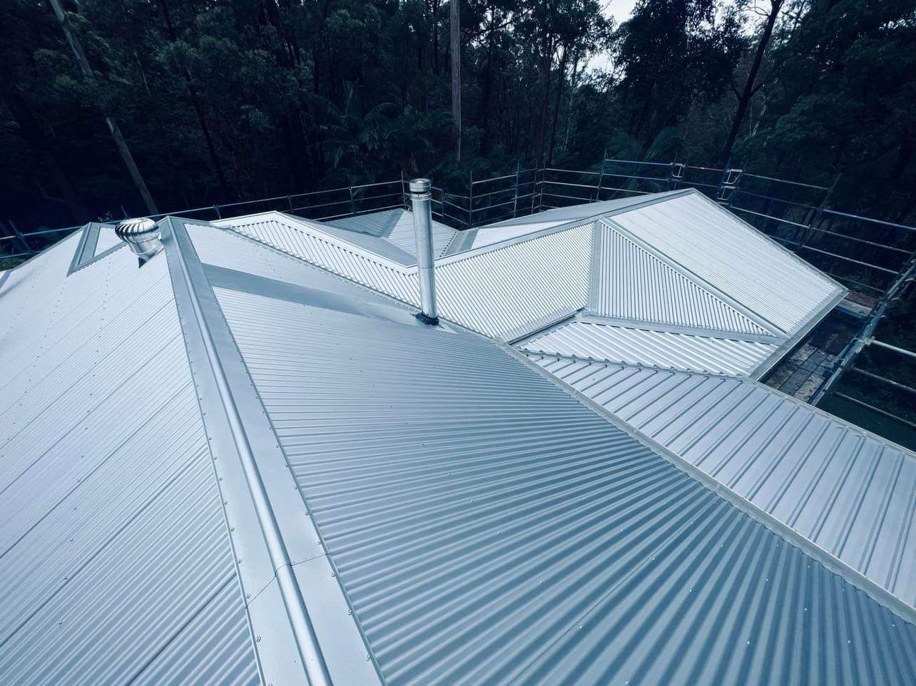 Modern Home's Roof, Featuring Metal Panels in Shades of Gray — Venom Roofing Pty Ltd in Sunshine Coast, QLD