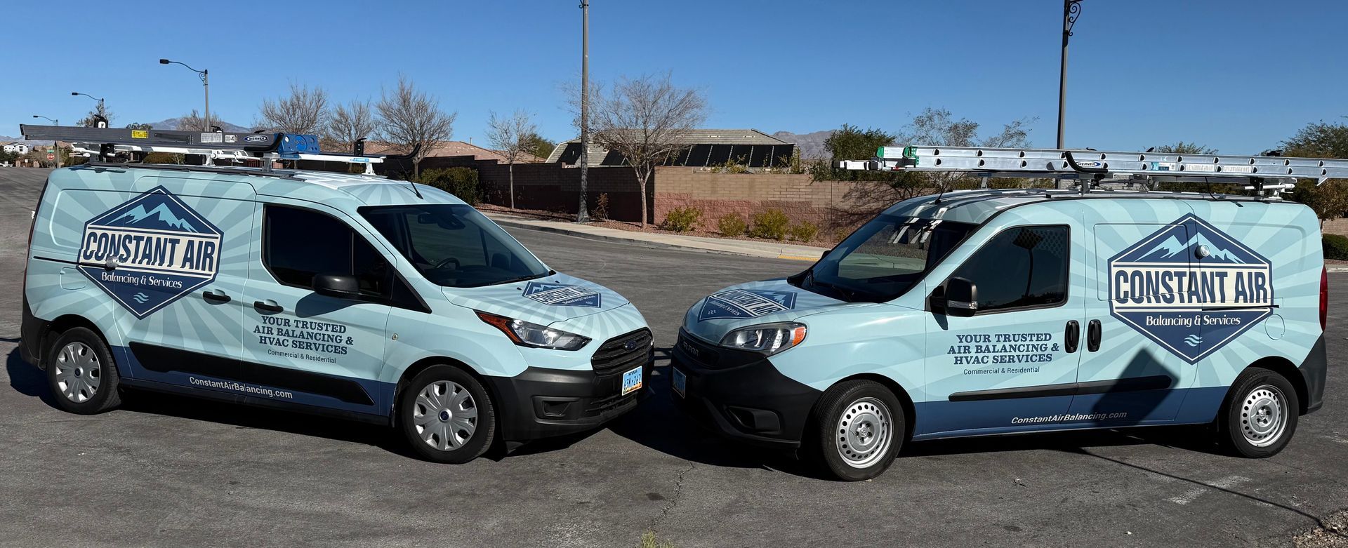 HVAC unit in an attic with ductwork, electrical wires, and wooden support beams.