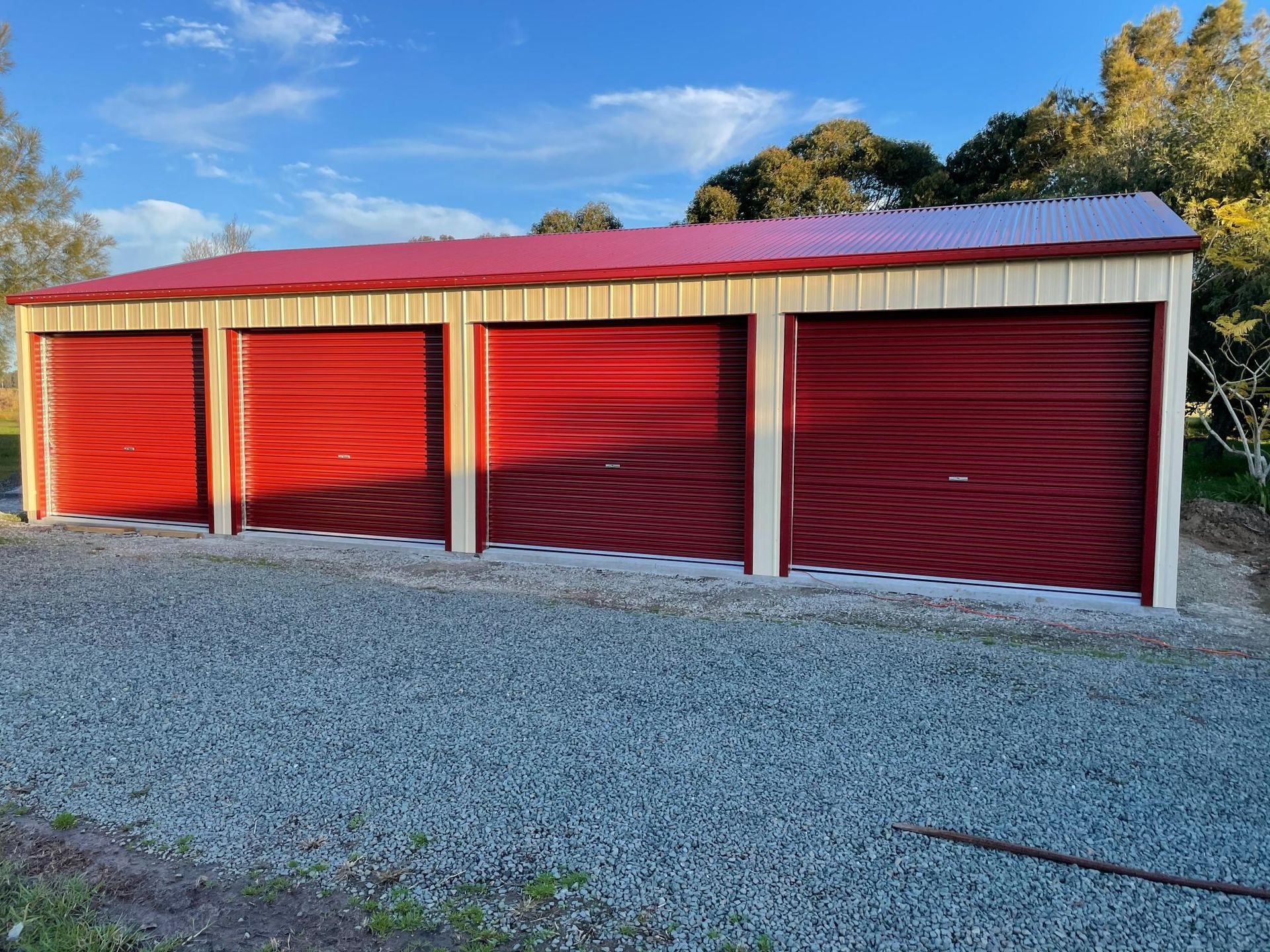 Green and White Open-sided Shelter With Red Supports — Bridgey's Constructions in Harrington, NSW