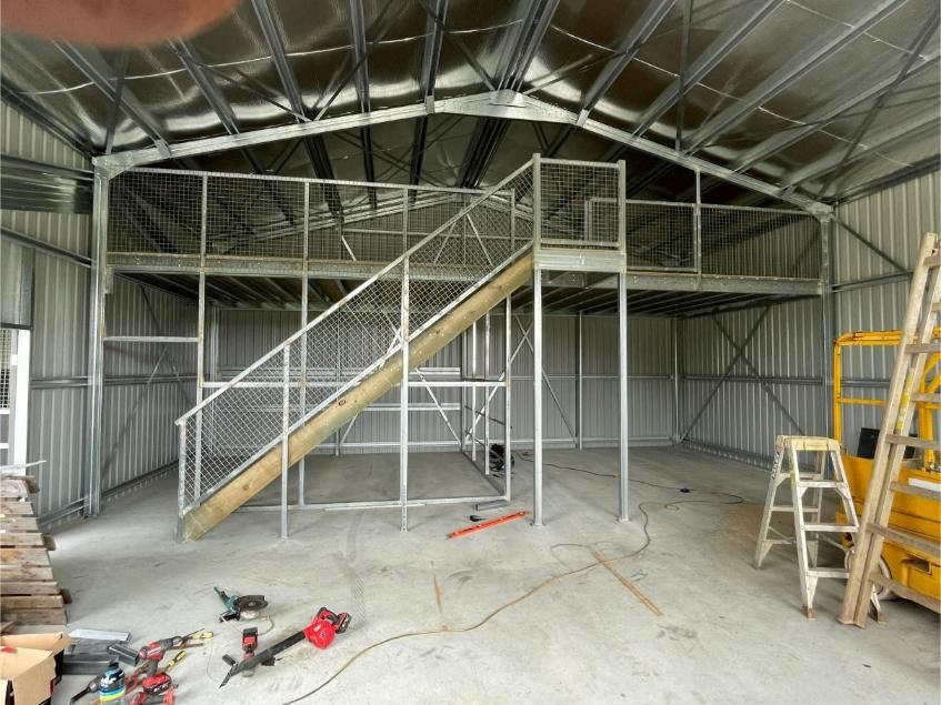 Interior of a Metal Shed With a Newly Constructed Mezzanine — Bridgey's Constructions in Gloucester, NSW