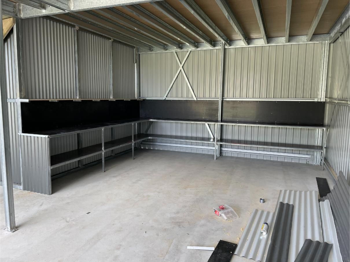 Interior View of a Metal Shed With a Concrete Floor — Bridgey's Constructions in Old Bar, NSW