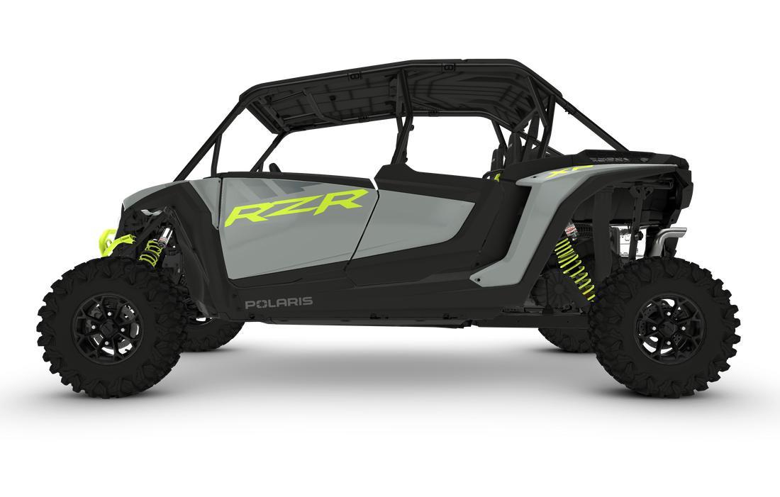 A polaris rzr maverick x4 is shown on a white background.
