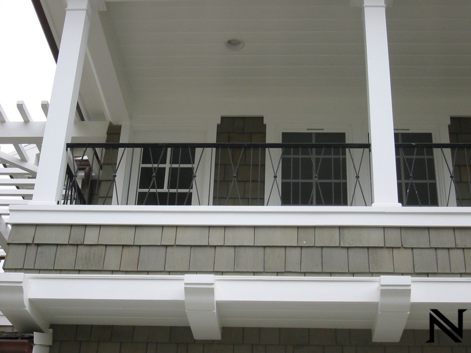 A balcony with the letter n on the bottom right