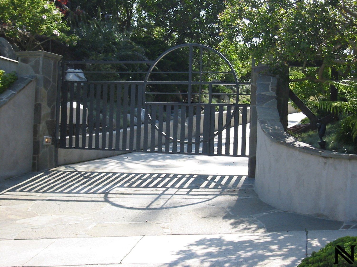 A gate that has the letter n on it