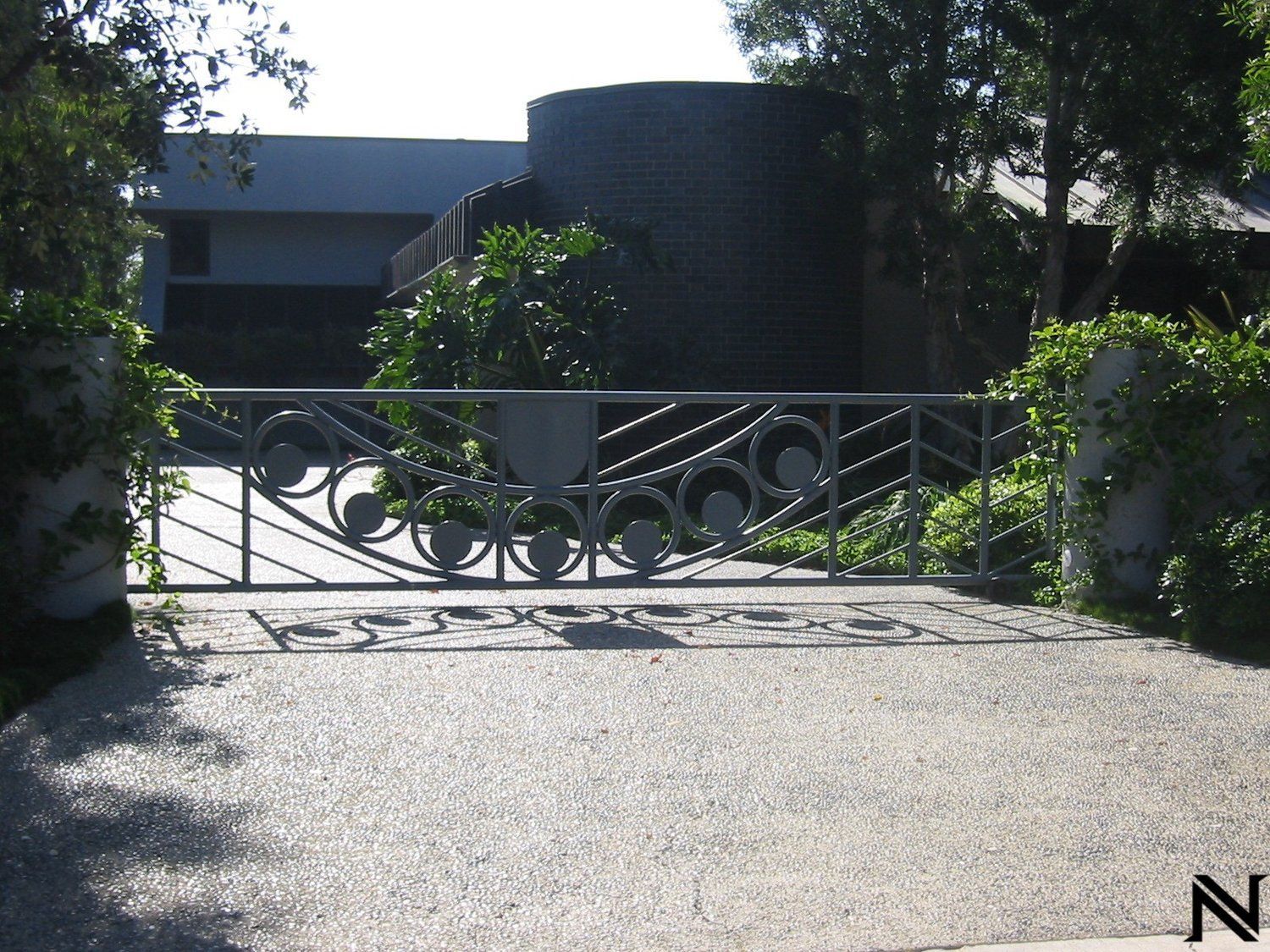 A gate that has the letter n on it