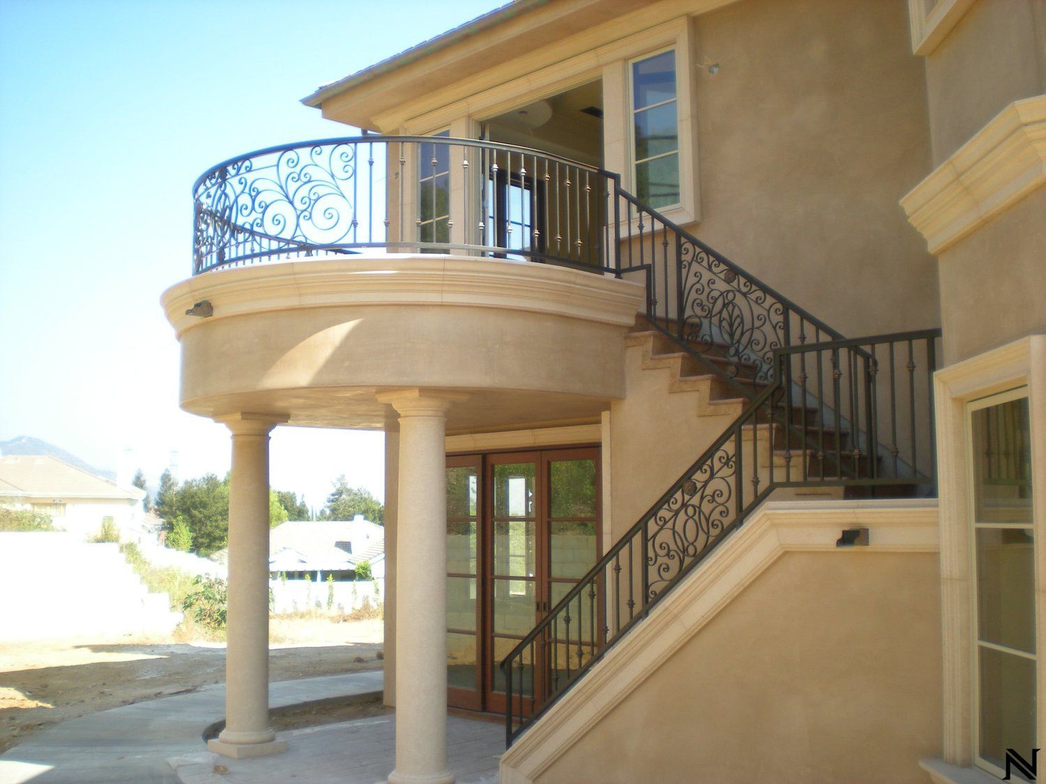 A house with stairs leading up to the second floor