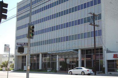 Auto Outside the Tall Building — Sherman Oaks, CA — Sunshield Glass Tinting