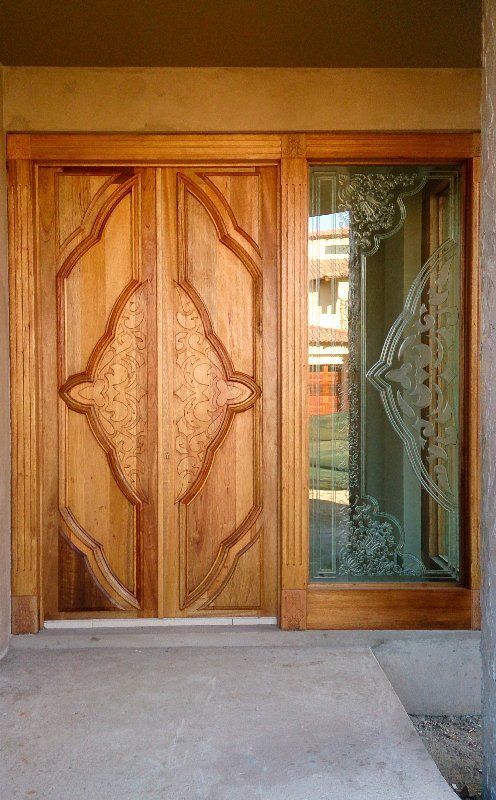 Grapedoor Custom made glass door with ornate carved design