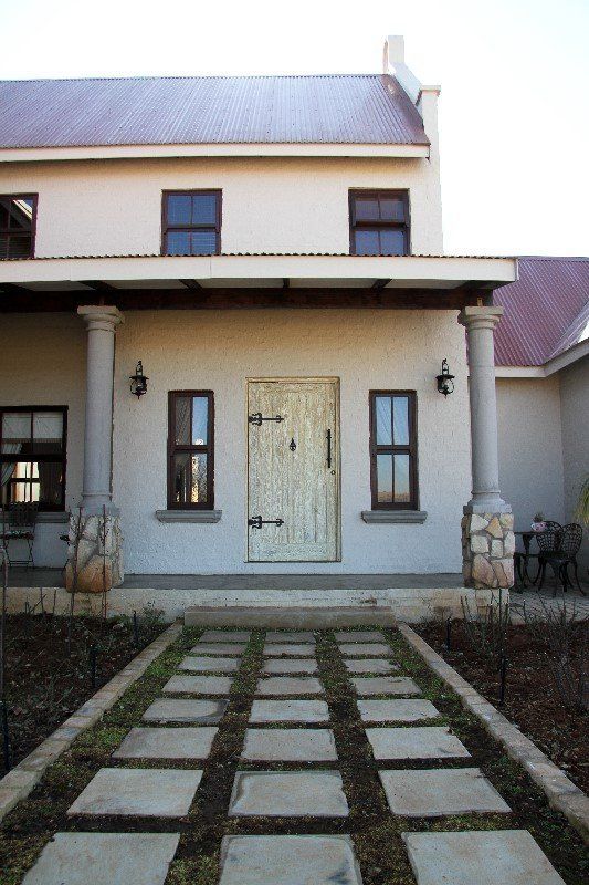 Grapedoor Custom Made Wooden Door with decorative hinges