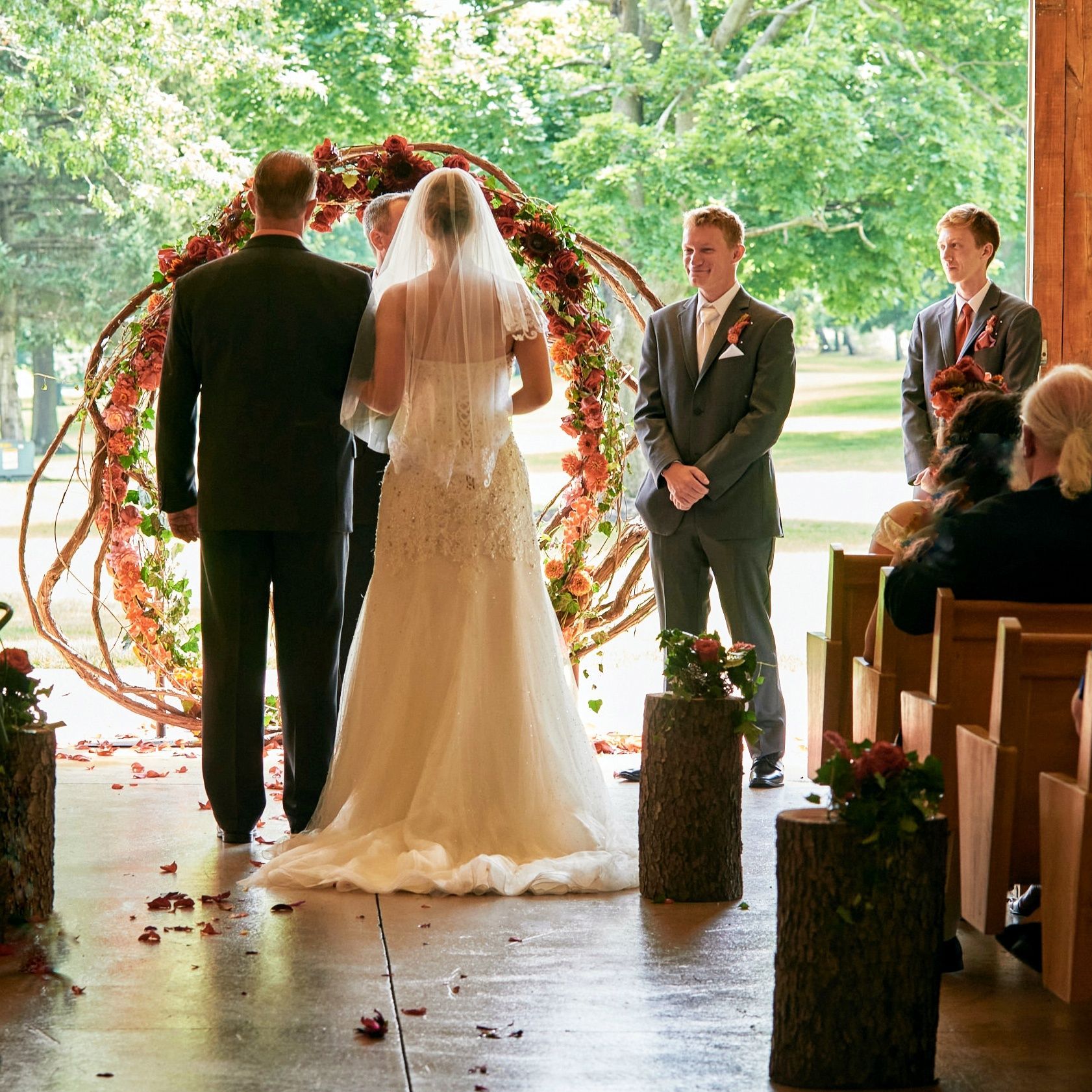 A bride and groom are getting married in a church