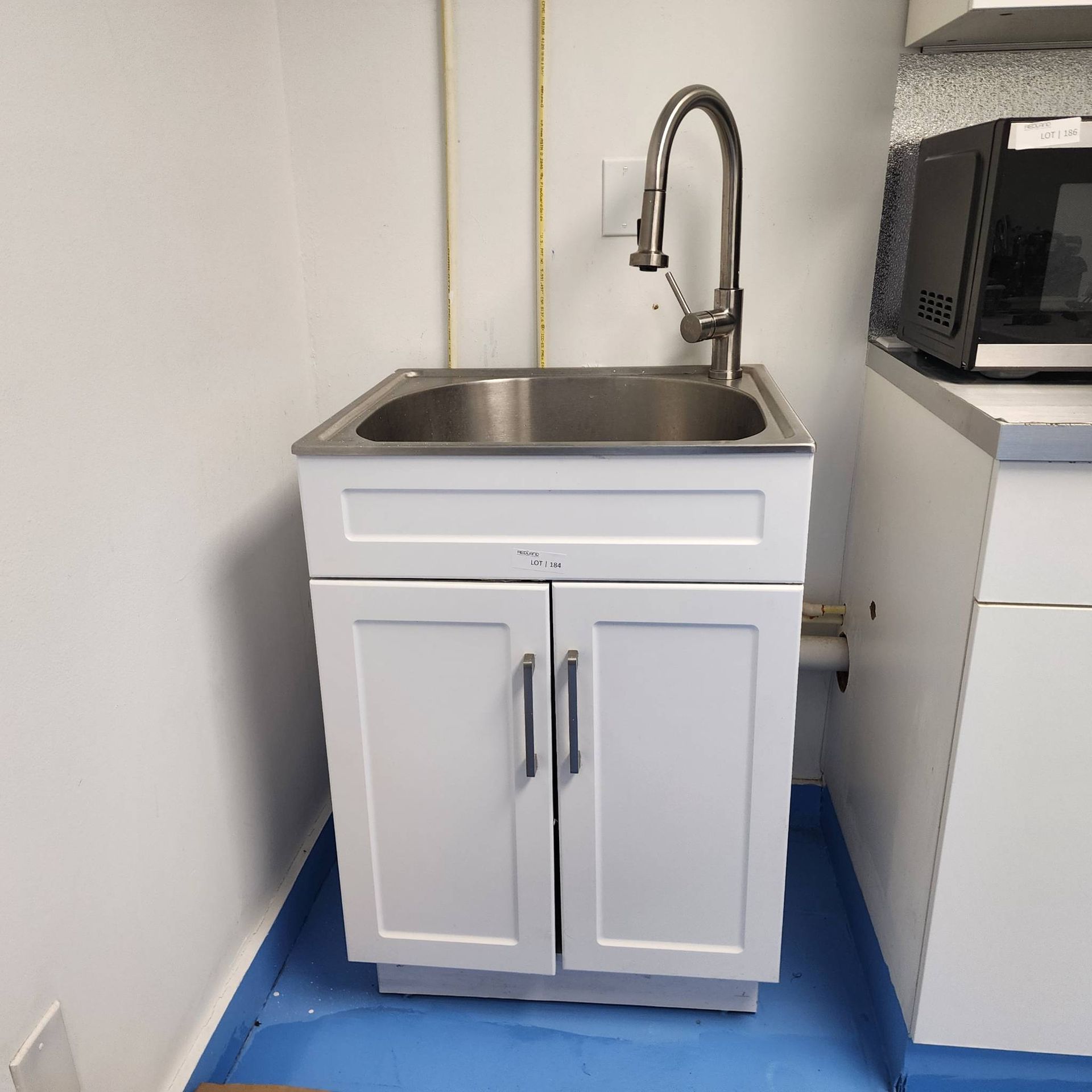 Lot 184 - Stainless Steel Sink with Cabinet and Contents