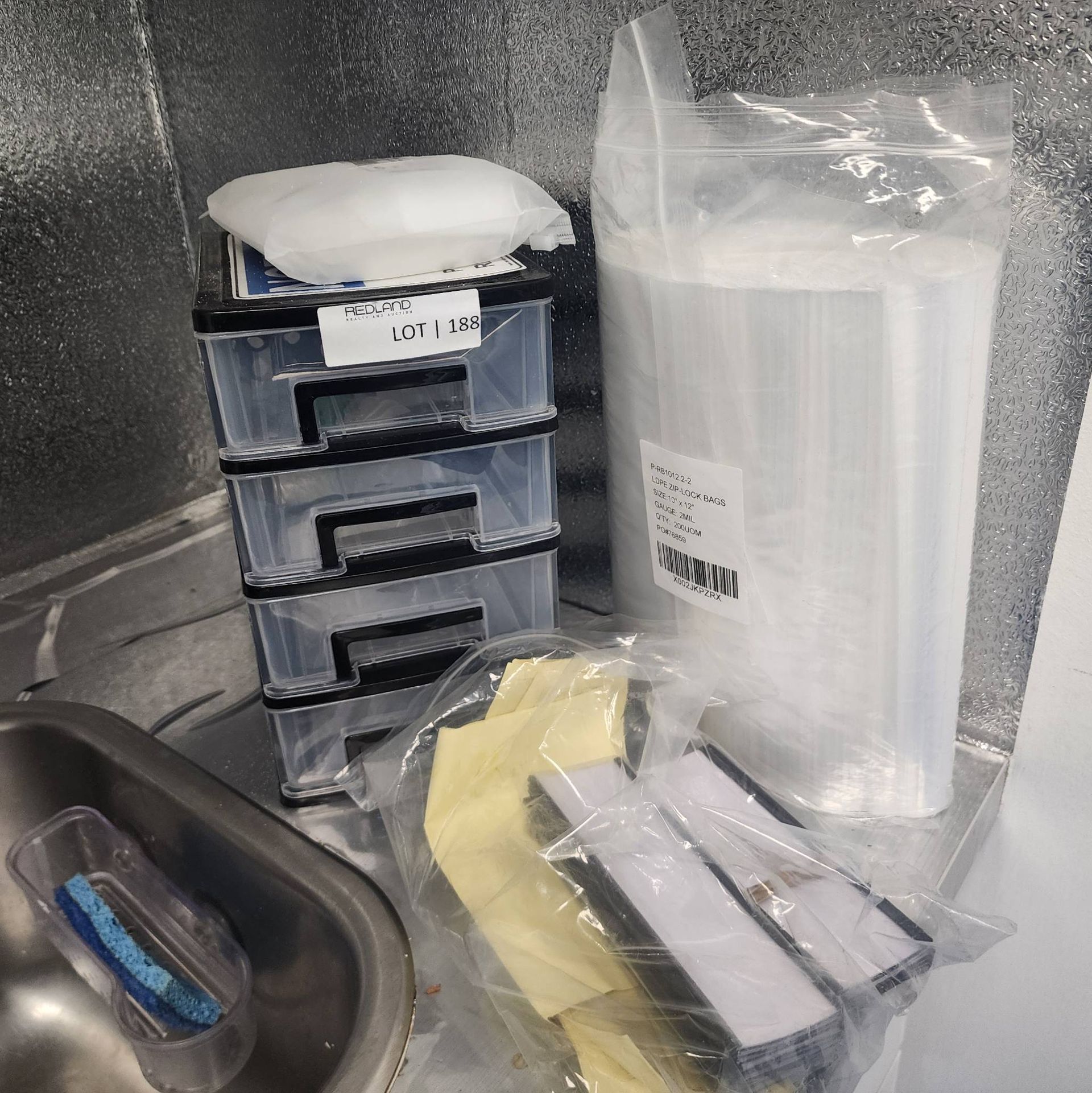 Lot 188 - Small Storage Bin and Packaging Supplies