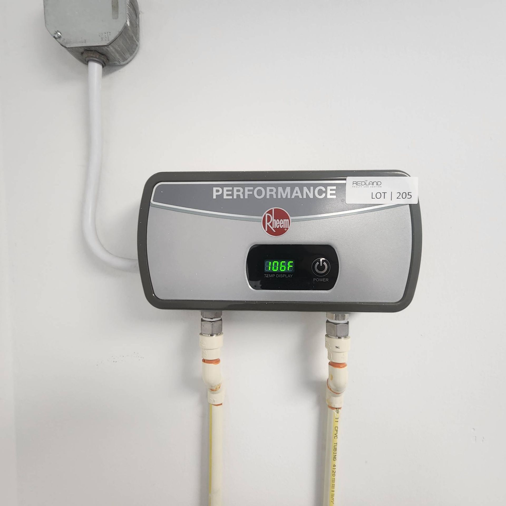 Lot 205 - Rheem RETEX-04 Tankless Water Heater