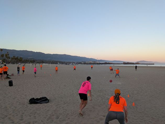 Kickball is being played at West Beach in Santa Barbara, CA with Double Play Socials.