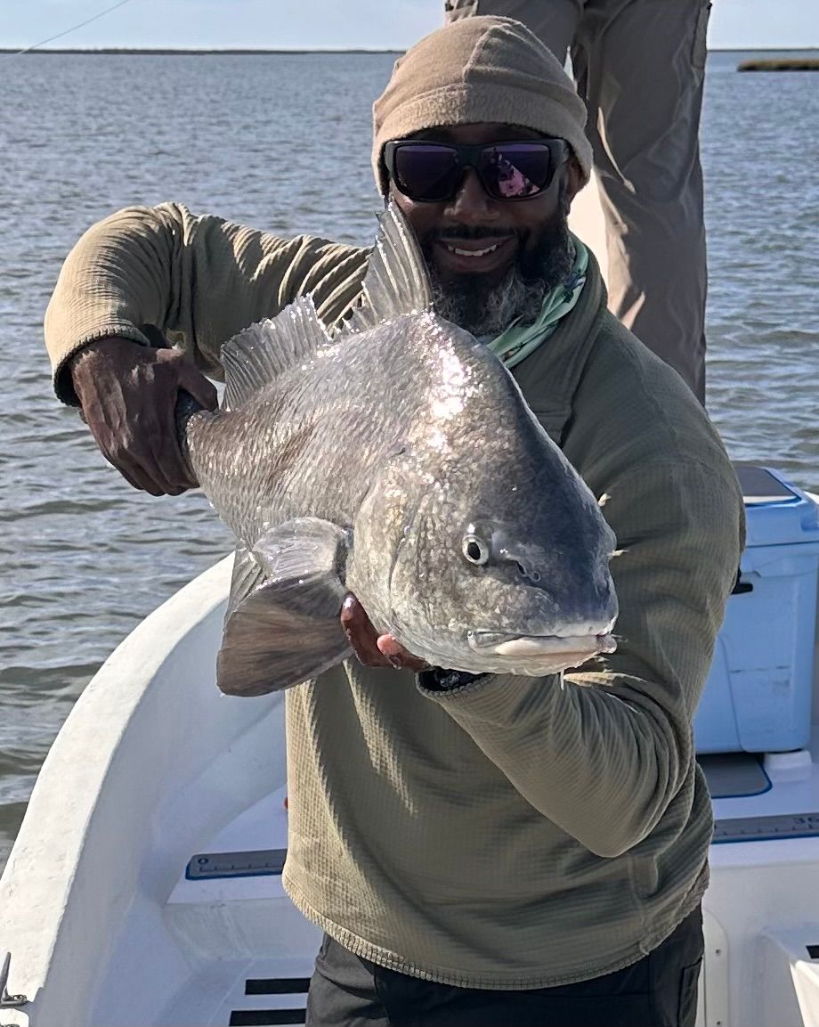 T sporting his catch in the winter time. 6